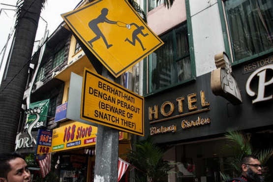Подобные знаки не случайно украшают центральные районы малайских городов